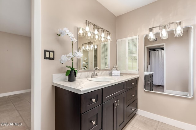 6025 N 10th Pl, Phoenix, AZ 85014 - full bathroom featuring tile patterned floors and vanity