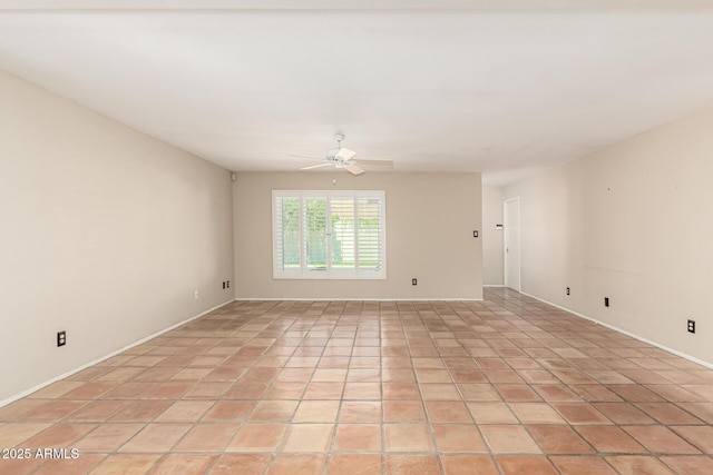 6025 N 10th Pl, Phoenix, AZ 85014 - spare room with a ceiling fan and light tile patterned floors