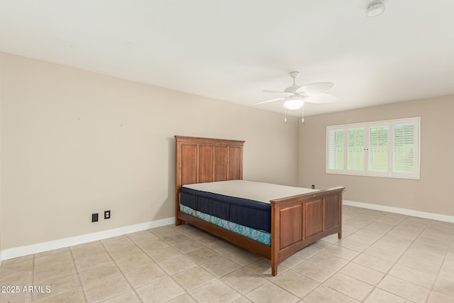 6025 N 10th Pl, Phoenix, AZ 85014 - bedroom featuring light tile patterned flooring and a ceiling fan