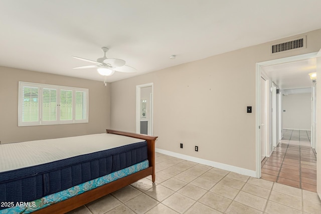 6025 N 10th Pl, Phoenix, AZ 85014 - bedroom featuring light tile patterned floors and ceiling fan