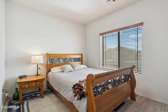 bedroom featuring light wood-type flooring