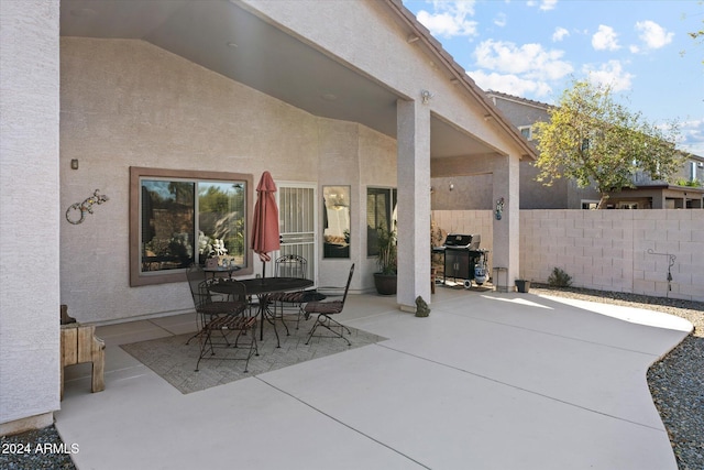 view of patio with a grill