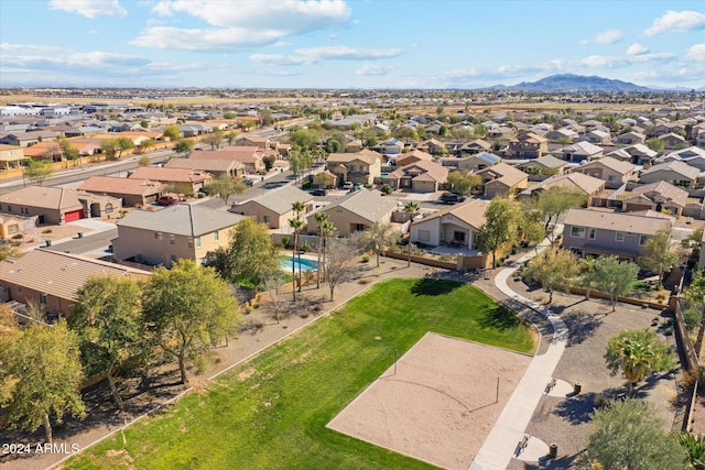 birds eye view of property with a mountain view