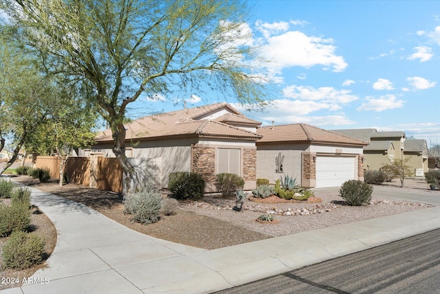 view of front of home featuring a garage