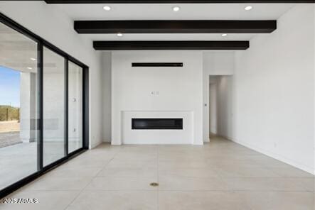 unfurnished living room featuring a glass covered fireplace, beamed ceiling, and recessed lighting