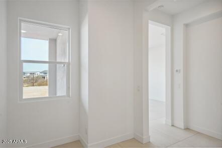 interior space with baseboards