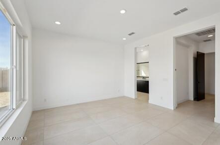 unfurnished bedroom featuring recessed lighting and visible vents