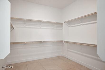 walk in closet featuring tile patterned floors