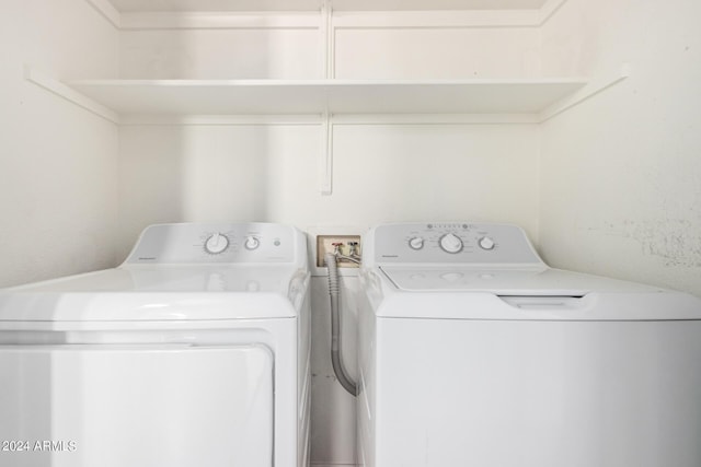 laundry room with independent washer and dryer