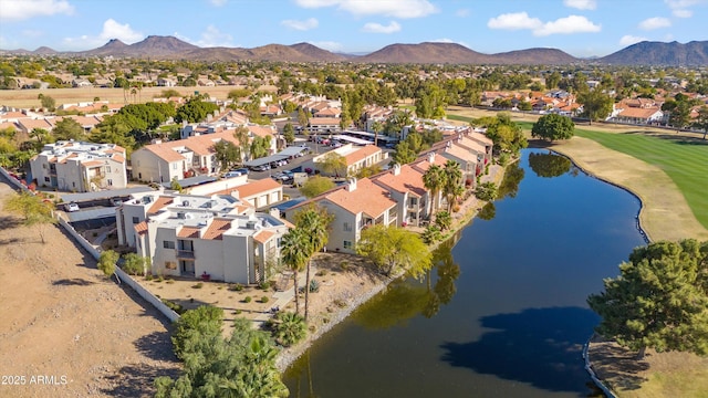 bird's eye view featuring a water and mountain view