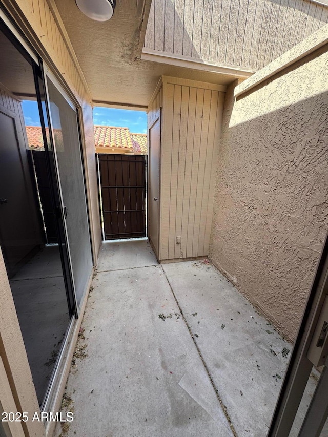 view of patio / terrace with a gate
