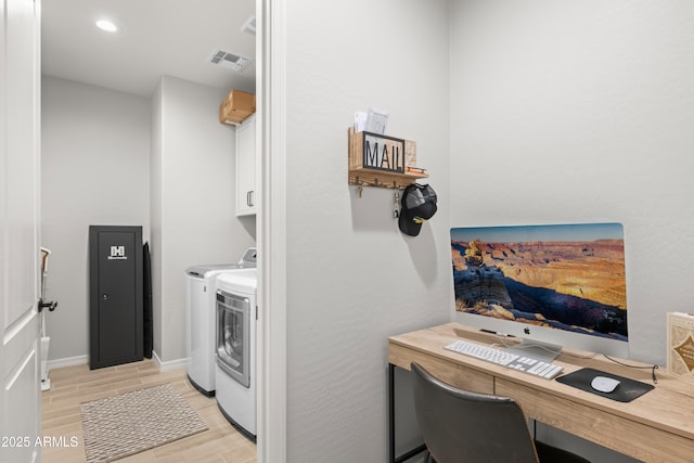 3505 W Verde River Rd, San Tan Valley, AZ 85144 - clothes washing area featuring cabinet space, visible vents, washer and clothes dryer, and light wood-style floors
