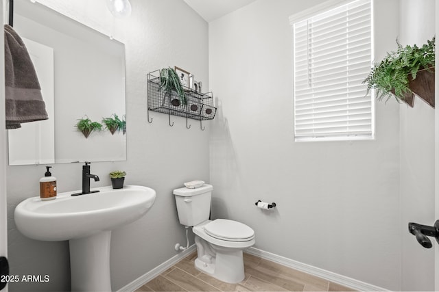 3505 W Verde River Rd, San Tan Valley, AZ 85144 - half bath featuring toilet, wood finished floors, and baseboards