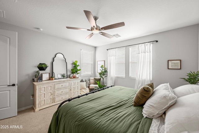 3505 W Verde River Rd, San Tan Valley, AZ 85144 - bedroom with visible vents, ceiling fan, light colored carpet, and baseboards