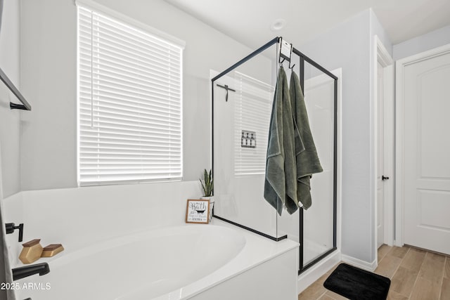 3505 W Verde River Rd, San Tan Valley, AZ 85144 - full bathroom featuring a shower stall, a bath, and wood finished floors