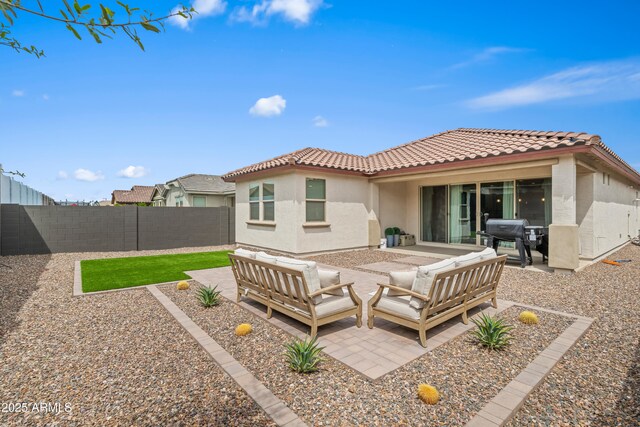 3505 W Verde River Rd, San Tan Valley, AZ 85144 - rear view of property featuring a tiled roof, outdoor lounge area, a fenced backyard, stucco siding, and a patio