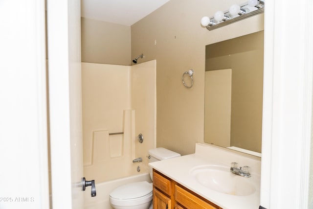 full bathroom with shower / tub combination, vanity, and toilet