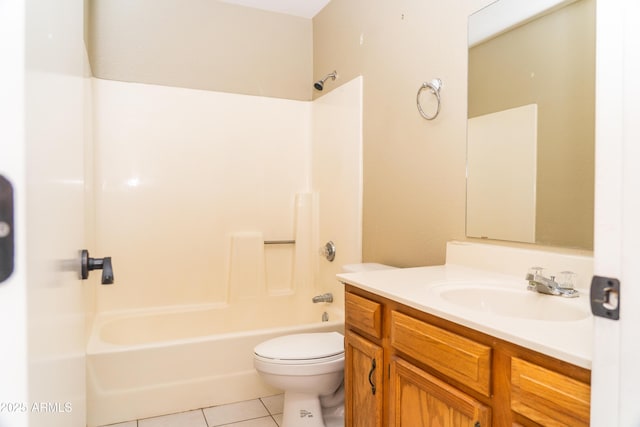 full bathroom featuring vanity, tile patterned floors, toilet, and bathtub / shower combination