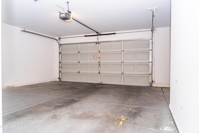 garage featuring a garage door opener