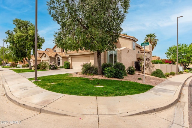 3832 N Gallatin, Mesa, AZ 85215 - view of front facade with a tile roof, concrete driveway, stucco siding, fence, and an attached garage