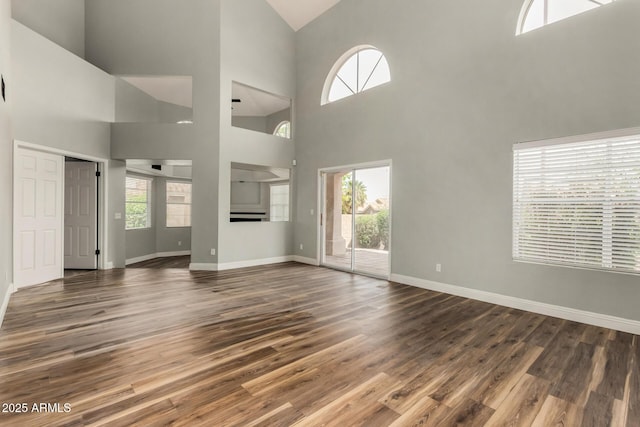 3832 N Gallatin, Mesa, AZ 85215 - unfurnished living room with baseboards and wood finished floors
