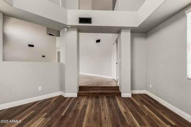 3832 N Gallatin, Mesa, AZ 85215 - unfurnished room with dark wood-style floors, visible vents, and baseboards