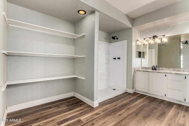 3832 N Gallatin, Mesa, AZ 85215 - bathroom with vanity, baseboards, wood finished floors, and walk in shower