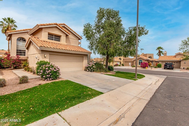 3832 N Gallatin, Mesa, AZ 85215 - mediterranean / spanish-style house with a tile roof, concrete driveway, stucco siding, a front yard, and a garage