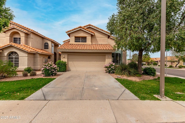 3832 N Gallatin, Mesa, AZ 85215 - mediterranean / spanish home featuring a tile roof, stucco siding, and driveway