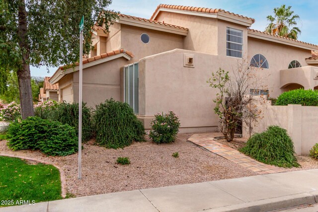 3832 N Gallatin, Mesa, AZ 85215 - view of front of home featuring a tile roof, stucco siding, and an attached garage