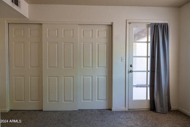 unfurnished bedroom with carpet