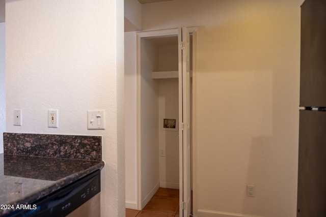 bathroom with tile patterned flooring