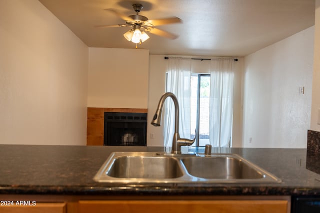 kitchen with ceiling fan and sink