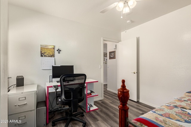 bedroom featuring wood finished floors and a ceiling fan