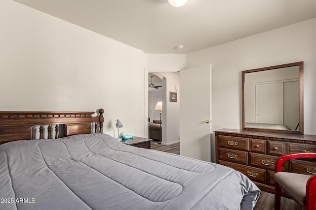 bedroom with wood finished floors