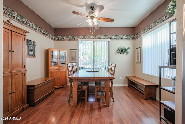 dining area featuring ceiling fan and hardwood / wood-style floors