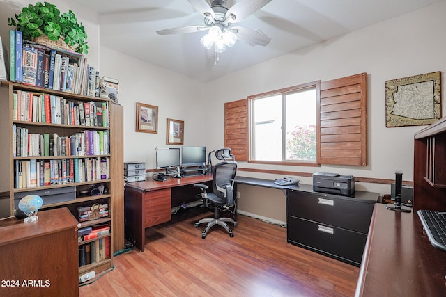 office area with ceiling fan and light hardwood / wood-style flooring