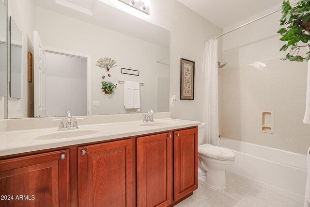 full bathroom with toilet, vanity, tile patterned floors, and shower / bathtub combination with curtain