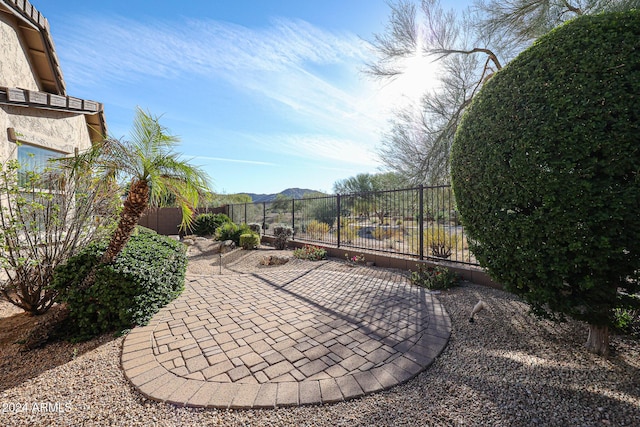 view of patio / terrace with a mountain view