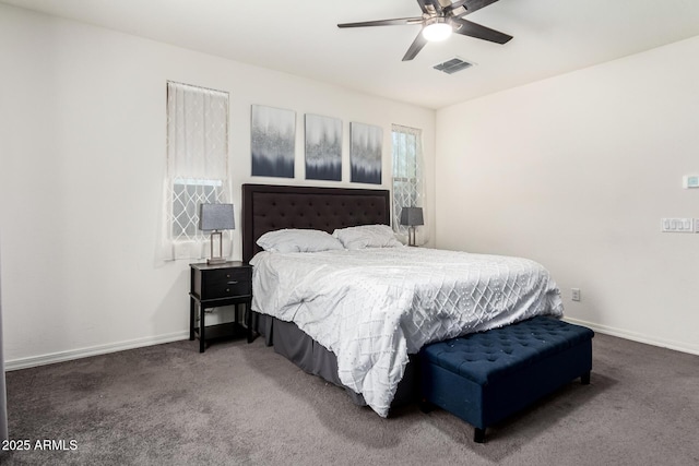 bedroom with carpet floors, baseboards, and visible vents