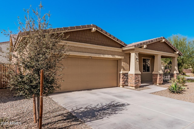 craftsman inspired home featuring driveway, a garage, stone siding, covered porch, and stucco siding