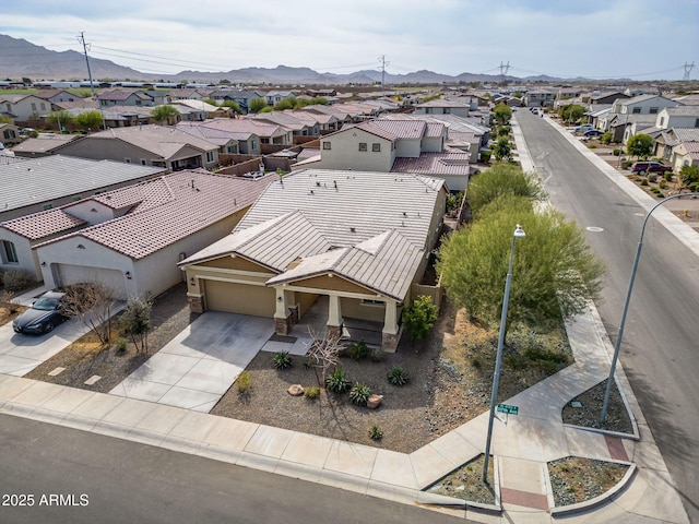 bird's eye view with a mountain view and a residential view