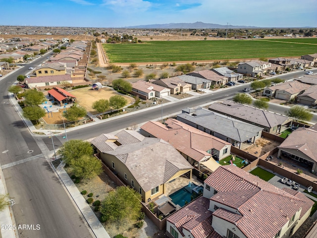 drone / aerial view with a mountain view and a residential view
