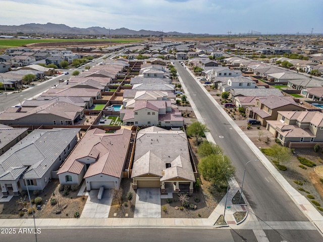 birds eye view of property with a residential view and a mountain view