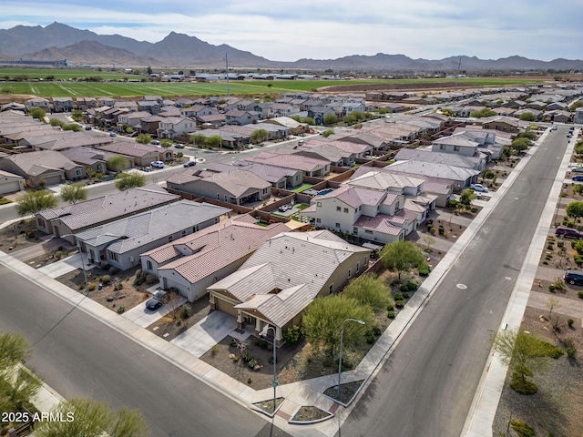 birds eye view of property featuring a mountain view and a residential view