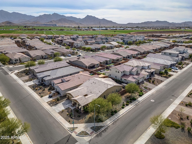 drone / aerial view featuring a mountain view and a residential view