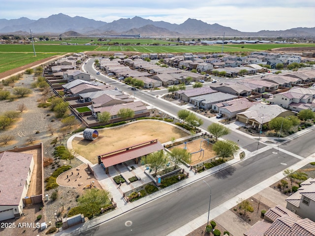 drone / aerial view with a residential view and a mountain view