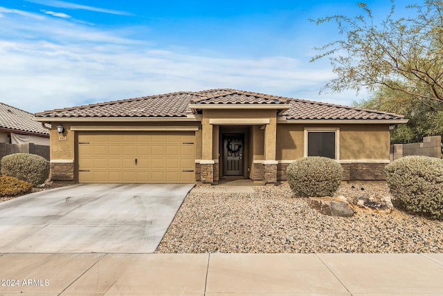 view of front of home with a garage