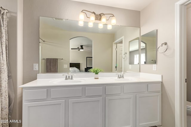 125 N Sunvalley Blvd Unit 119, Mesa, AZ 85207 - ensuite bathroom featuring a ceiling fan and double vanity