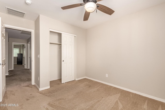 125 N Sunvalley Blvd Unit 119, Mesa, AZ 85207 - unfurnished bedroom featuring light colored carpet, a closet, and a ceiling fan